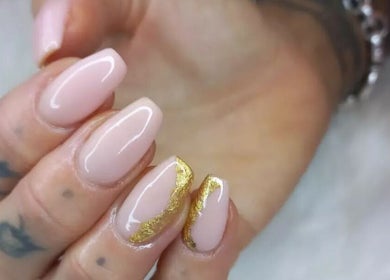 Elegant gold-accented manicure at T-Royals Beauty, Cape Town, Western Cape, ZA.
