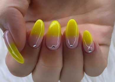 Elegant yellow ombre nails with rhinestones at T-Royals Beauty, Cape Town, Western Cape, ZA.