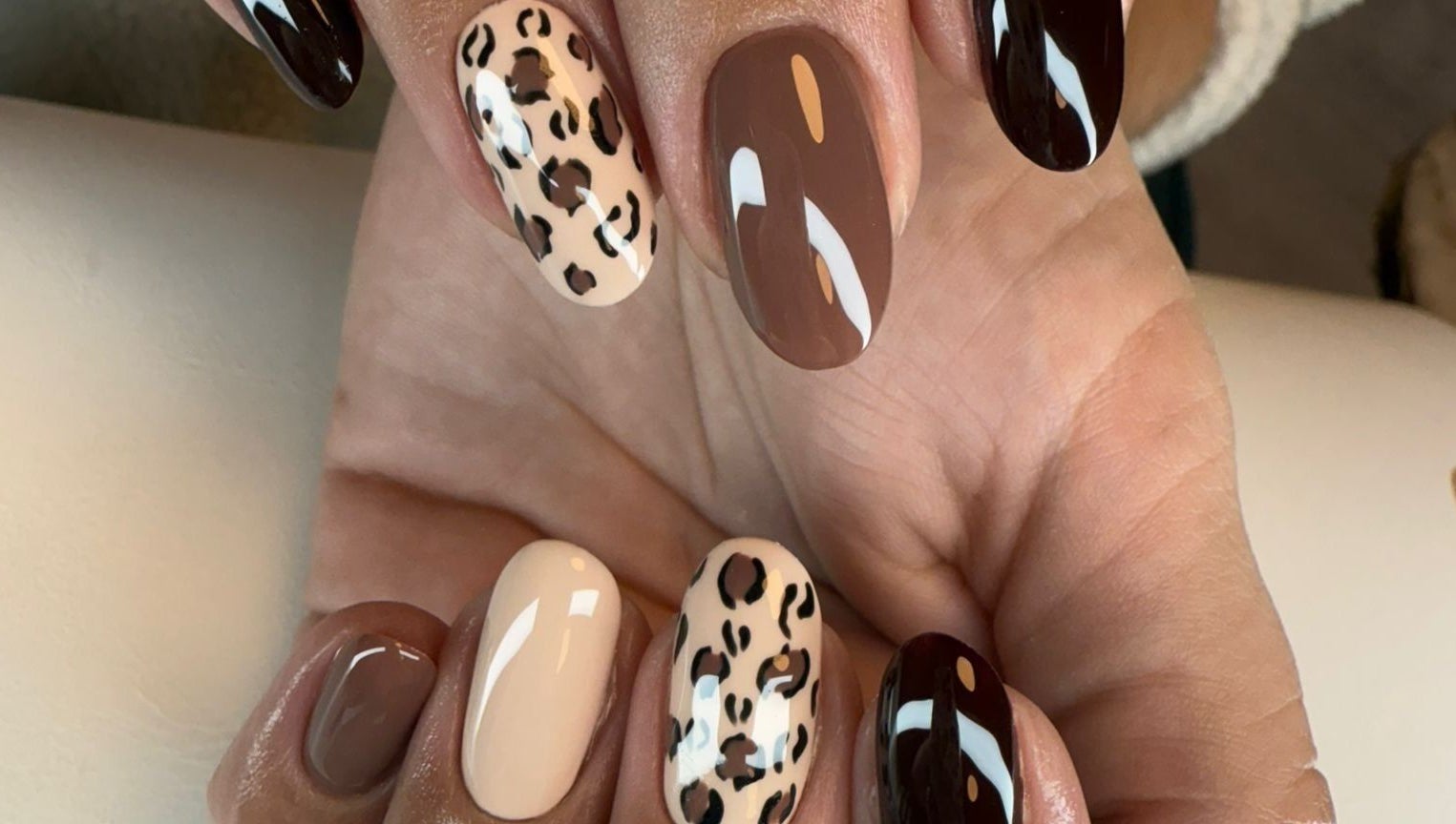 Stylish leopard print nails at BON ME LOUNGE, carrigtohill, County Cork, IE. Perfect blend of artistry and elegance.