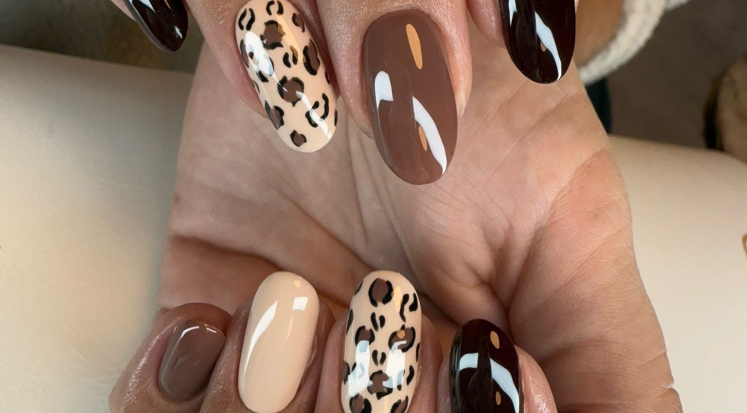 Stylish leopard print nails at BON ME LOUNGE, carrigtohill, County Cork, IE. Perfect blend of artistry and elegance.
