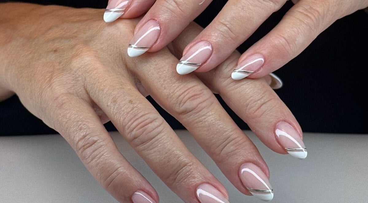 Chic white and silver nail art at BON ME LOUNGE, carrigtohill, County Cork, IE showcasing stylish manicure.