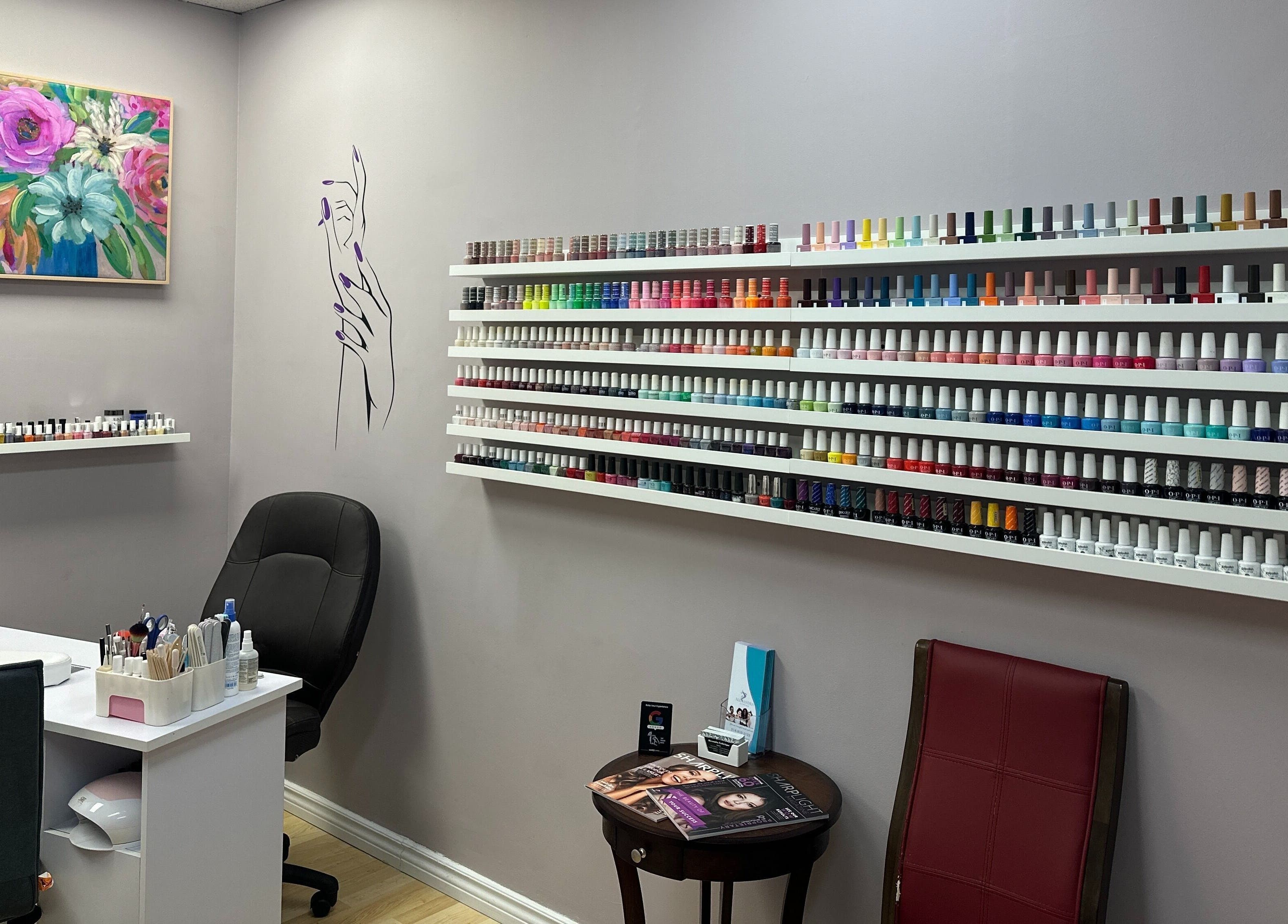 Nail polish display at Alexandra Esthetique, Montréal west, Québec, CA. A vibrant, colorful array in a cozy setting.