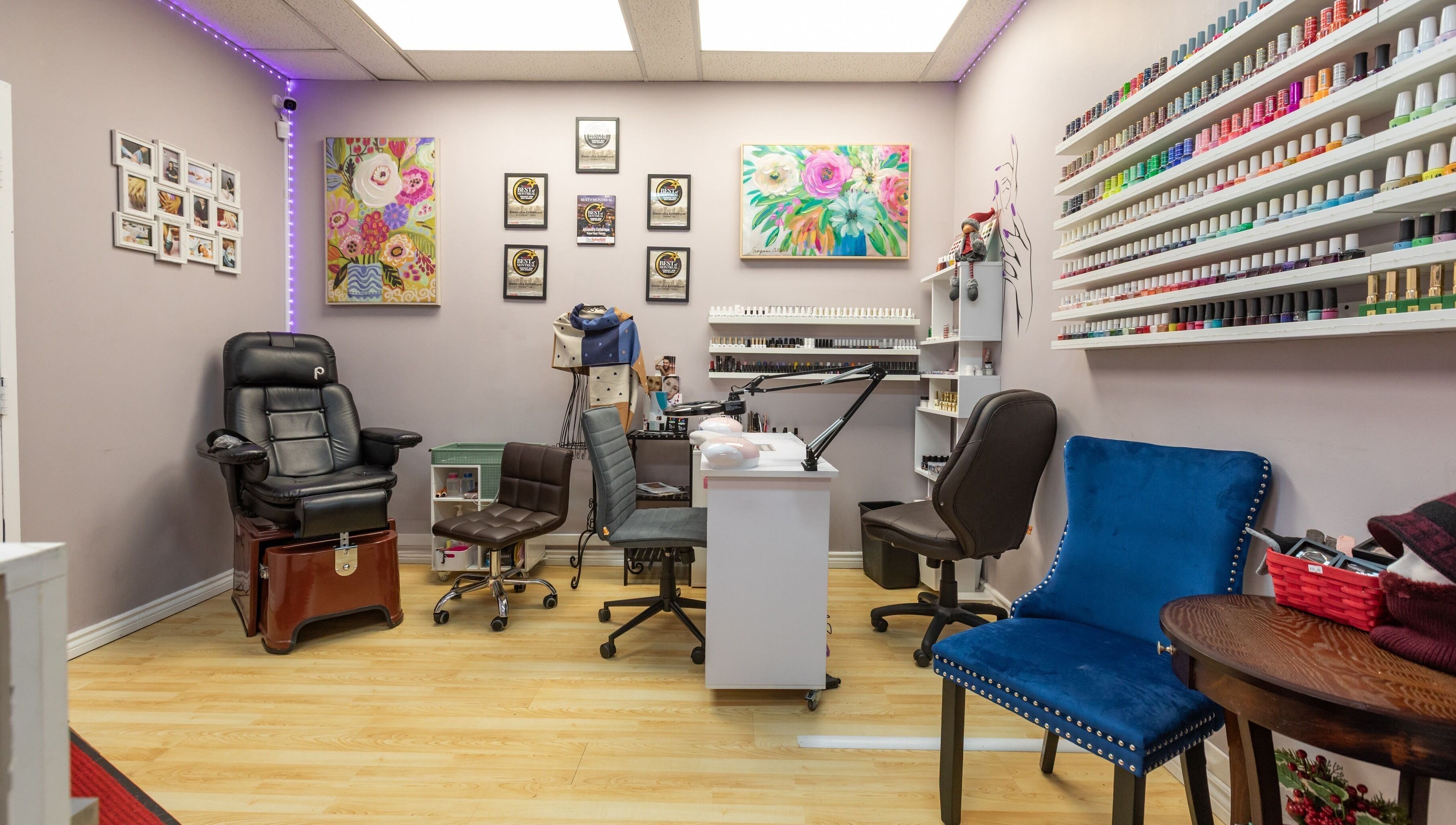 Nail salon interior at Alexandra Esthetique in Montréal west, Québec, CA with vibrant polish display.