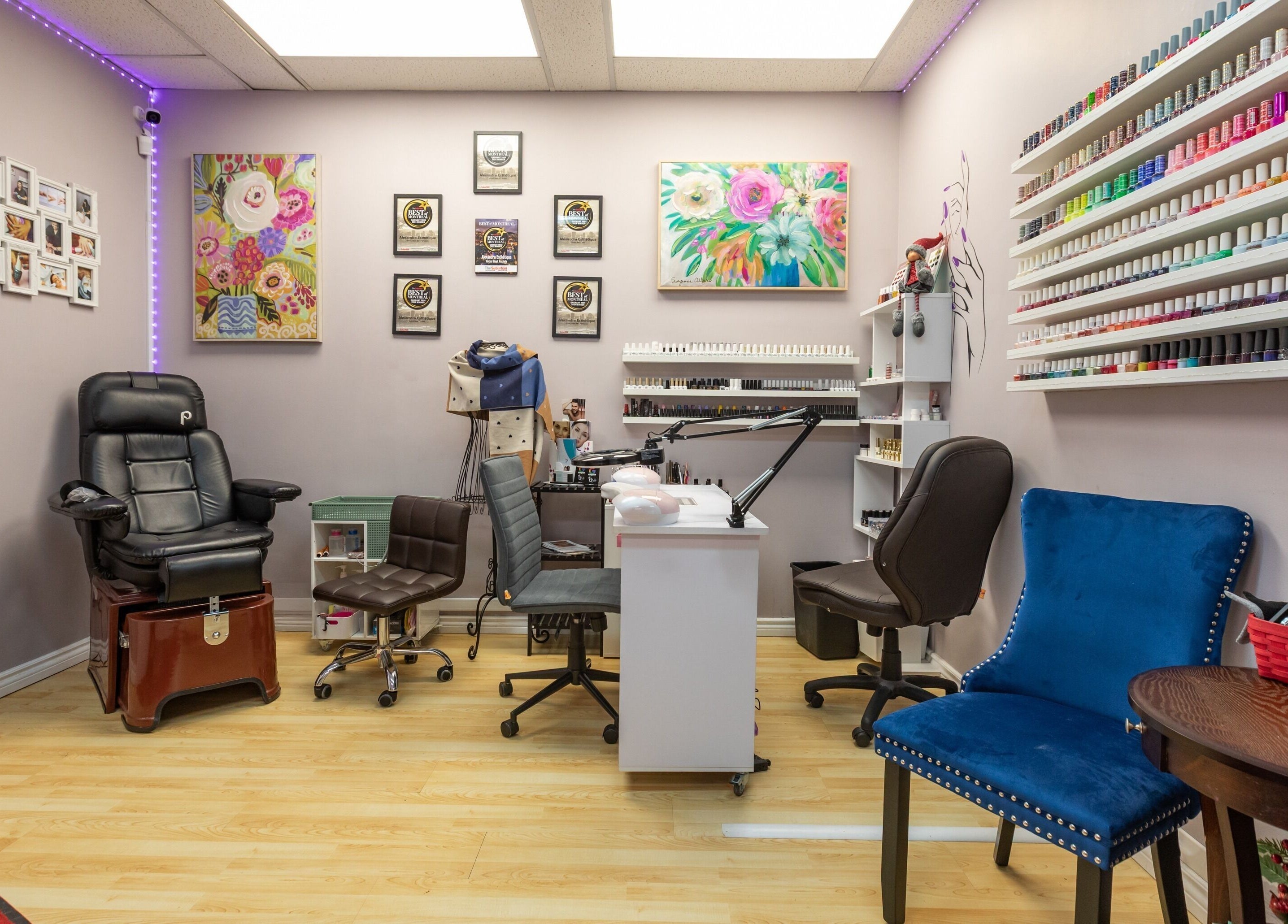 Nail salon interior at Alexandra Esthetique in Montréal west, Québec, CA with vibrant polish display.