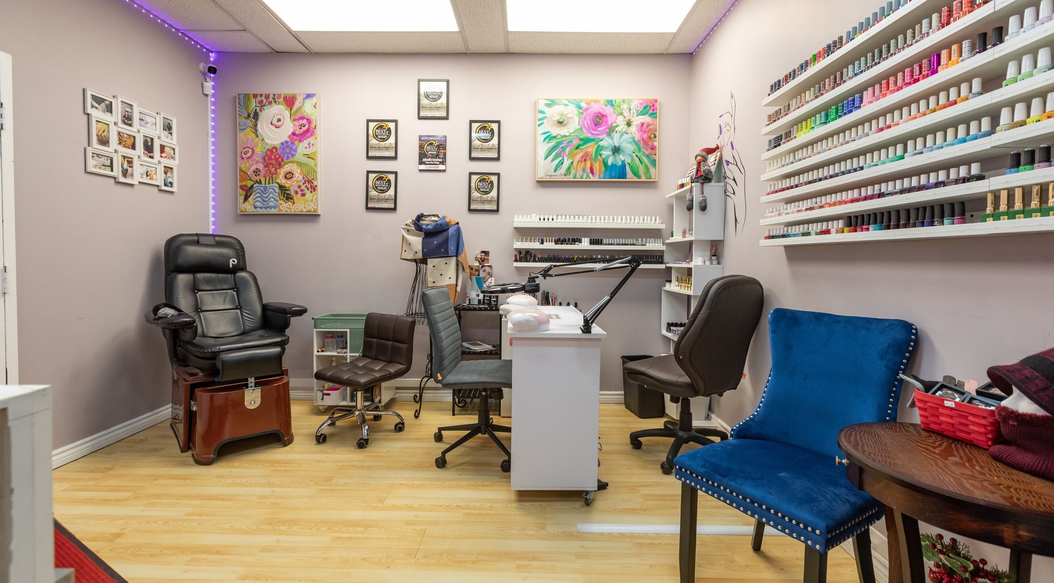 Nail salon interior at Alexandra Esthetique in Montréal west, Québec, CA with vibrant polish display.