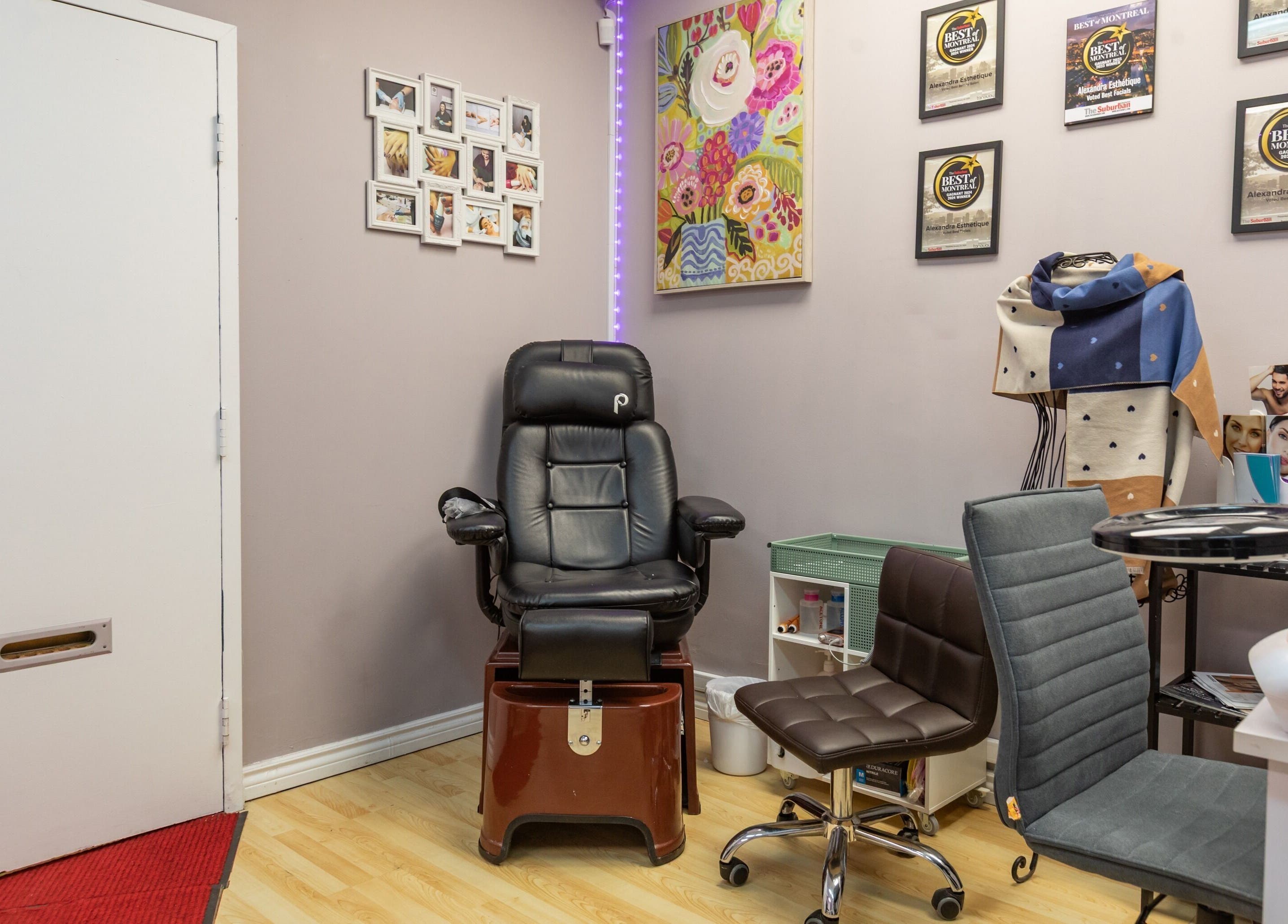 Cozy beauty setup at Alexandra Esthetique in Montréal west, Québec, CA, featuring plush chairs and awards.
