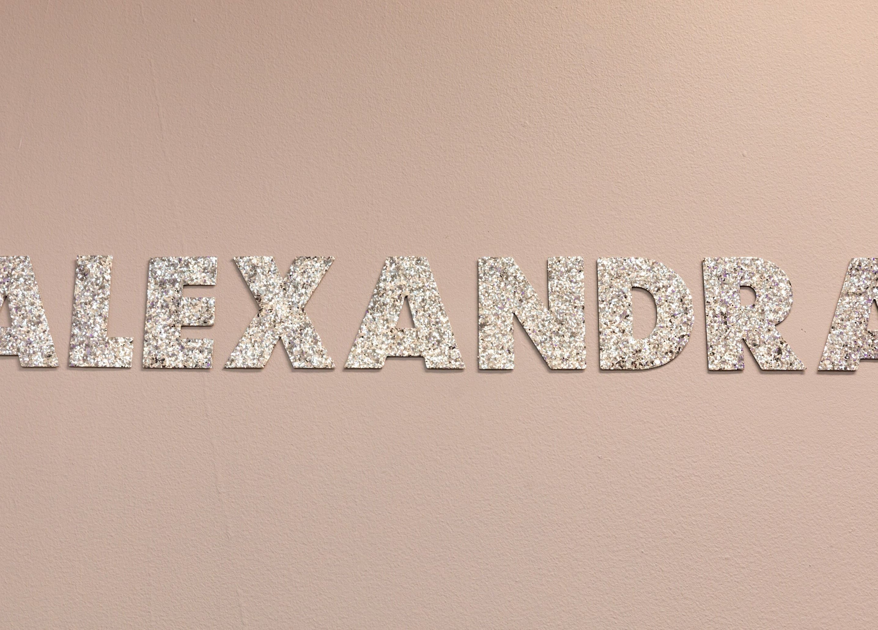 Glittering name sign of Alexandra Esthetique in Montréal west, Québec, CA.