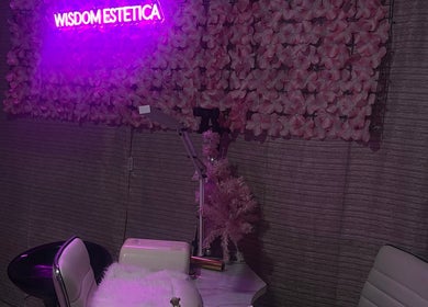 Cozy flower-themed beauty station at Wisdom Estética, Caledonia, Ontario, CA.