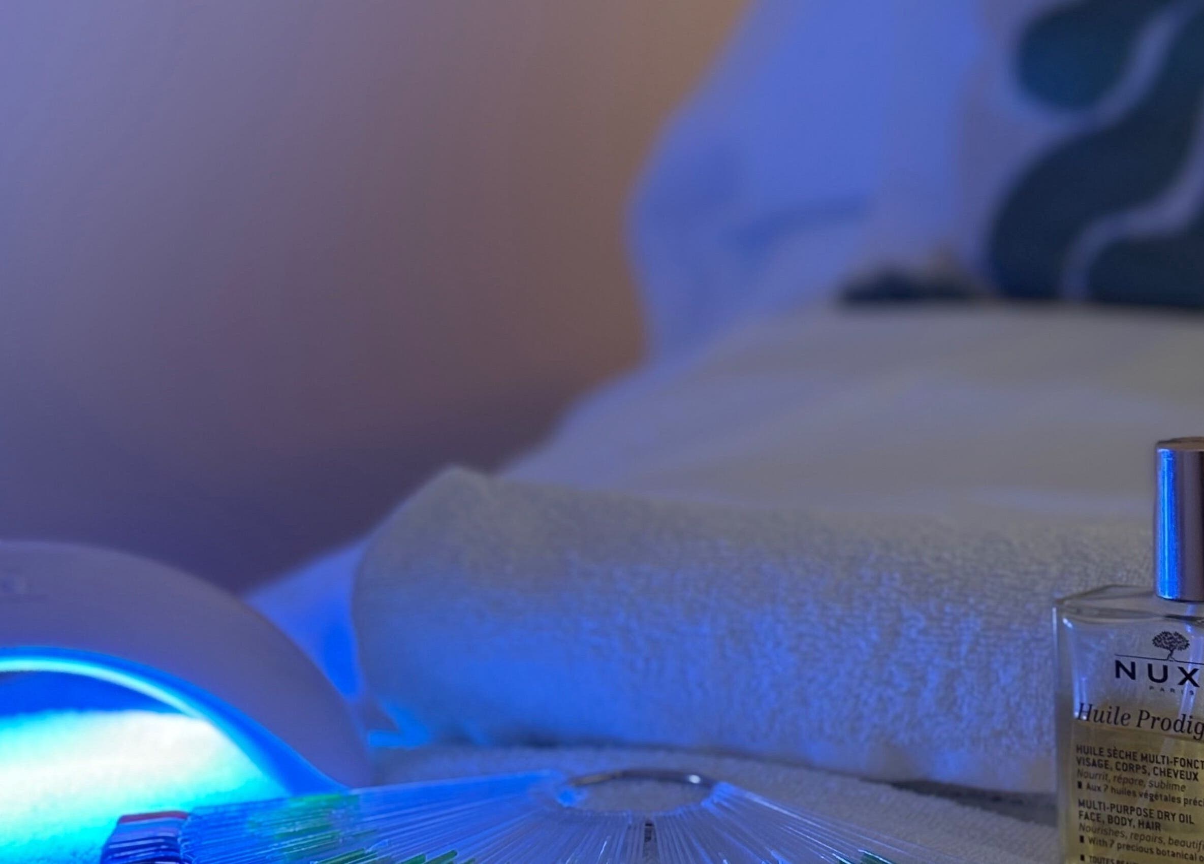 Serene spa setting with oil and light at Beauty Hub, Peterborough, England, GB.