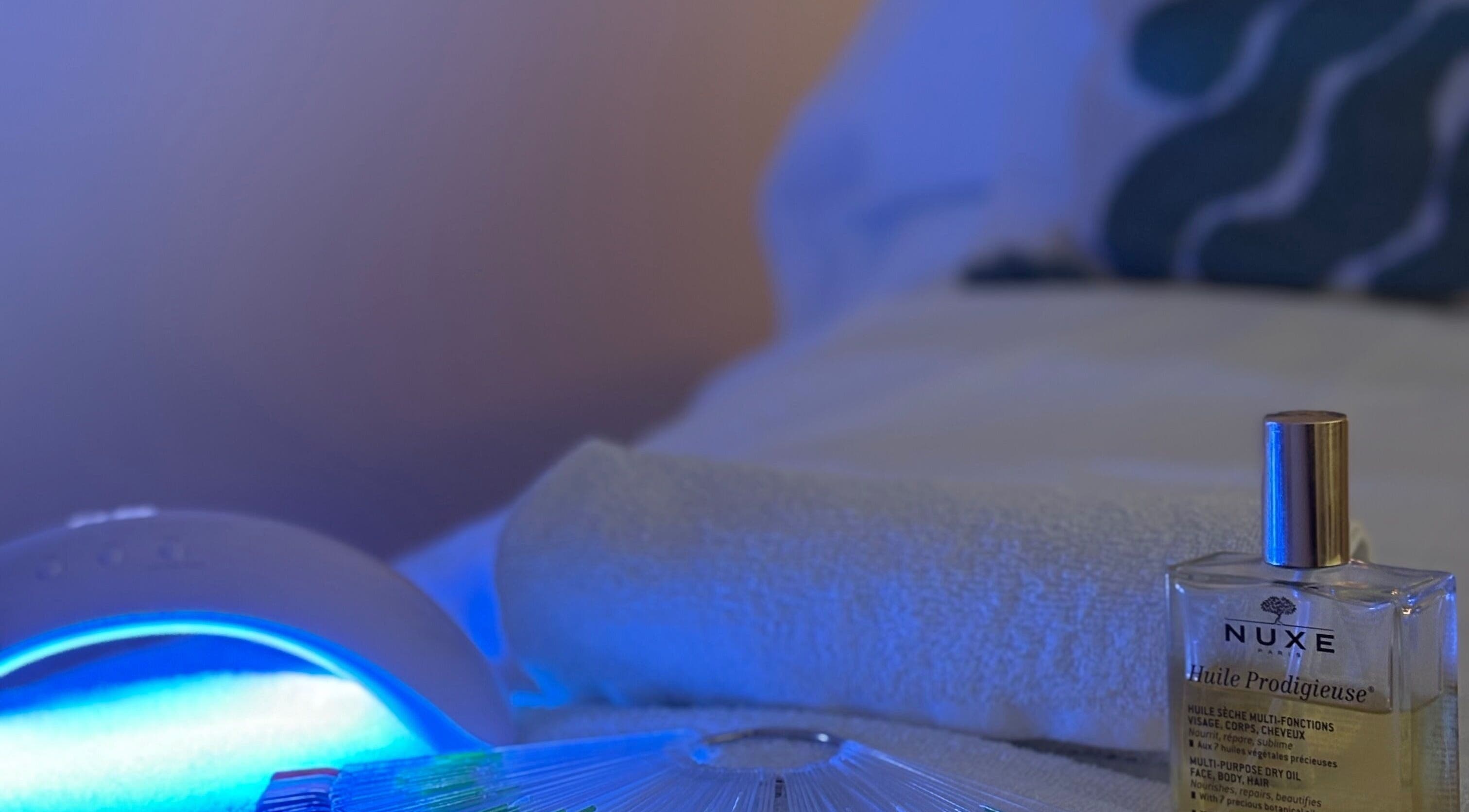 Serene spa setting with oil and light at Beauty Hub, Peterborough, England, GB.