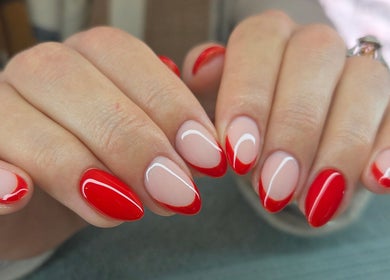 Stylish red manicure at Daniella Nail Studio, Randburg, Gauteng, ZA showcasing elegant artistry.