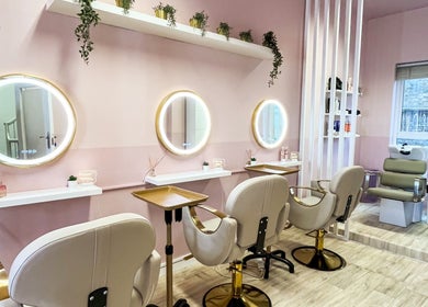 Lyn Beauty & Co. salon interior with elegant mirrors and chairs in Dublin, County Dublin, IE.