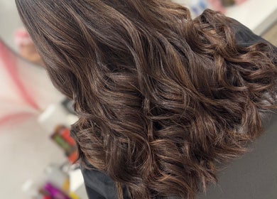 Luxurious curly hairstyle at LAB Hair Lashes in Welling, England, GB, showcasing expert styling.