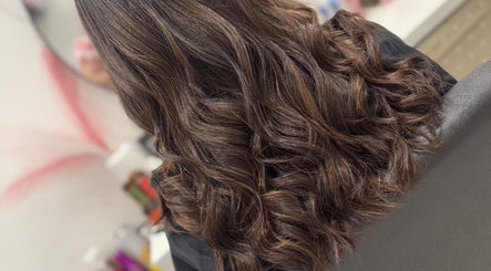 Luxurious curly hairstyle at LAB Hair Lashes in Welling, England, GB, showcasing expert styling.