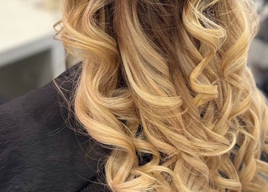 Elegant blonde curls styled at LAB Hair Lashes in Welling, England, GB, showcasing stunning hair artistry.