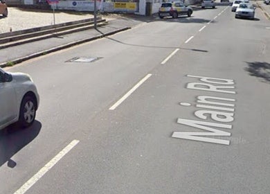 Street view near Wellue Beauty, Paarl, Western Cape, ZA. Cars parked along Main Rd.