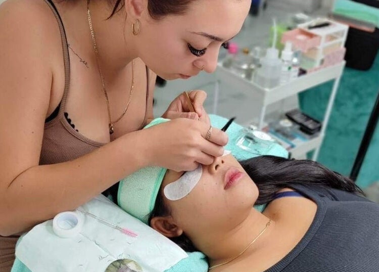 BeautifyMePerth expert applies eyelash extensions at Two Rocks, Western Australia, AU for flawless beauty.