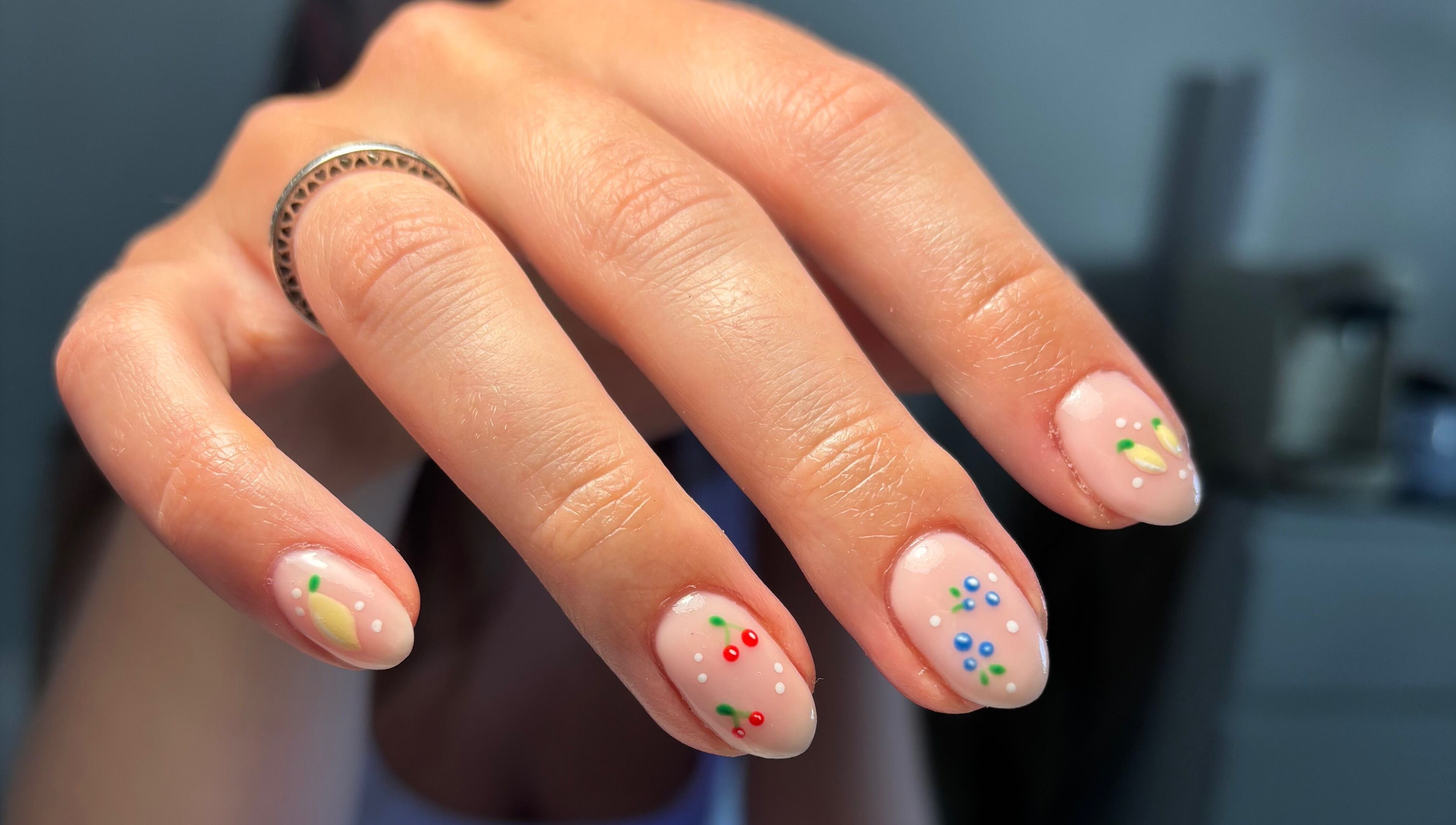 Elegant nail art with colorful dots and designs at So Gel, Kesgrave, England, GB.