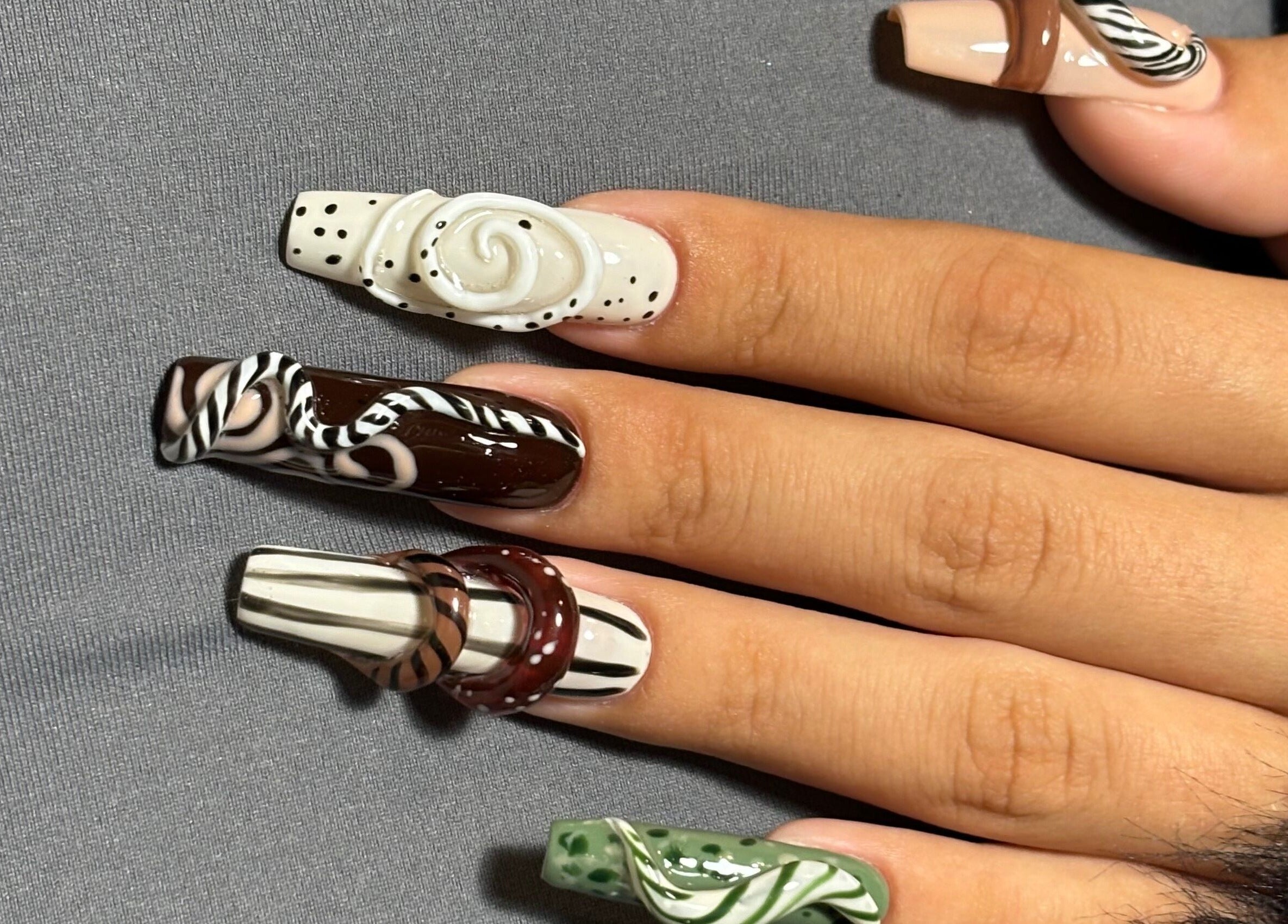 Creative nail art at Agrresandra Nail Atelier, Sofia, Sofia City Province, BG, featuring intricate 3D designs.