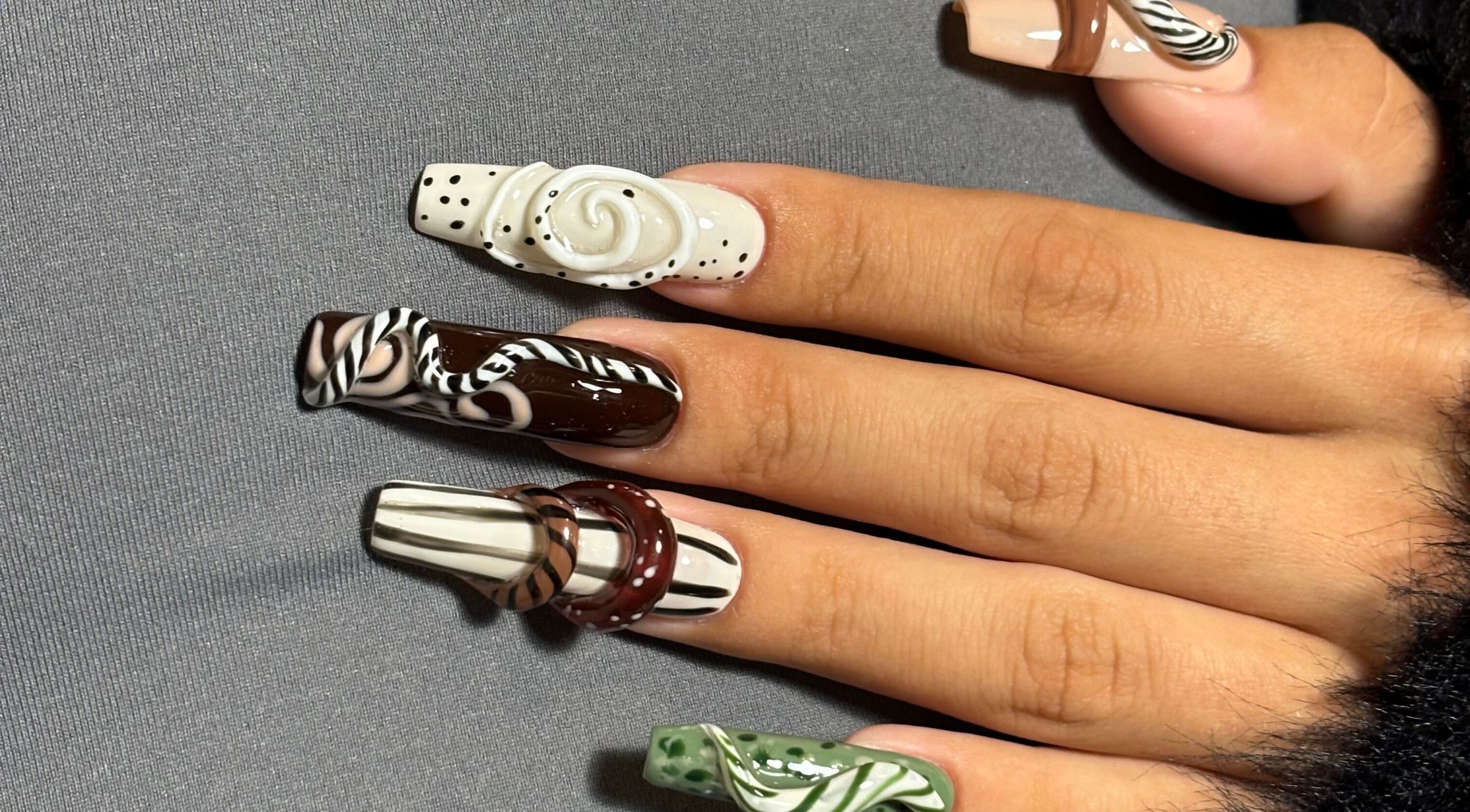 Creative nail art at Agrresandra Nail Atelier, Sofia, Sofia City Province, BG, featuring intricate 3D designs.
