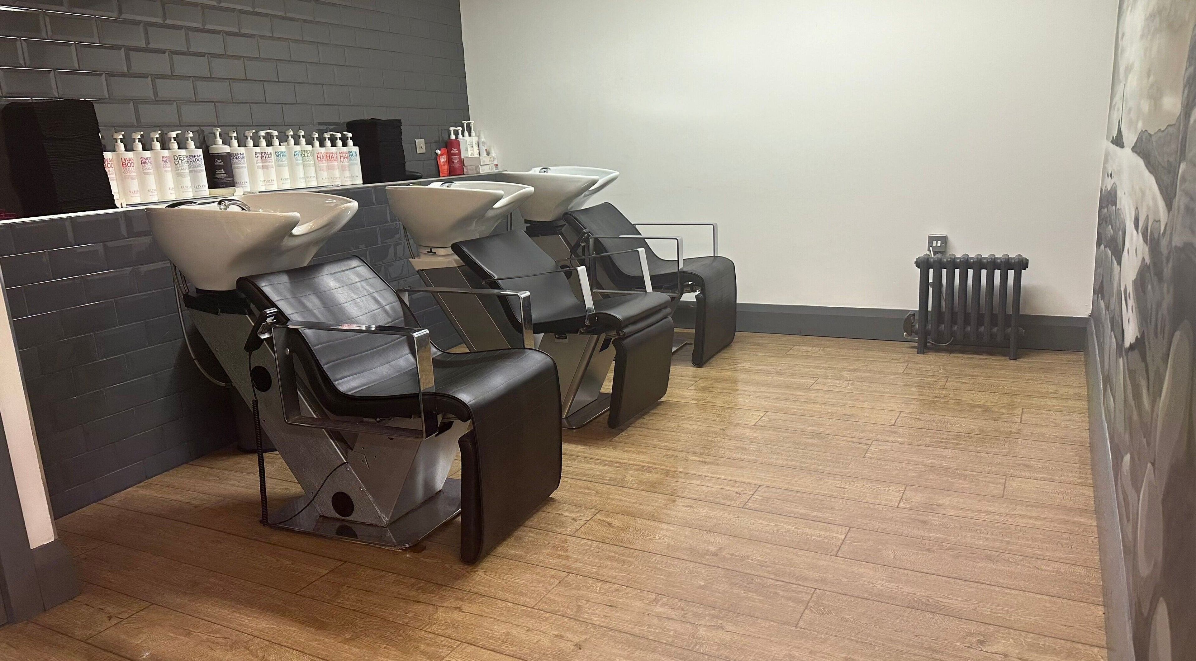 Modern hair wash stations at So & So Hairdressing in Whitley Bay, England, GB.