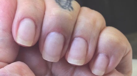 Close-up of natural nails at Melonie's Nail Salon, Hastings, England, GB showcasing clean, neat maintenance.