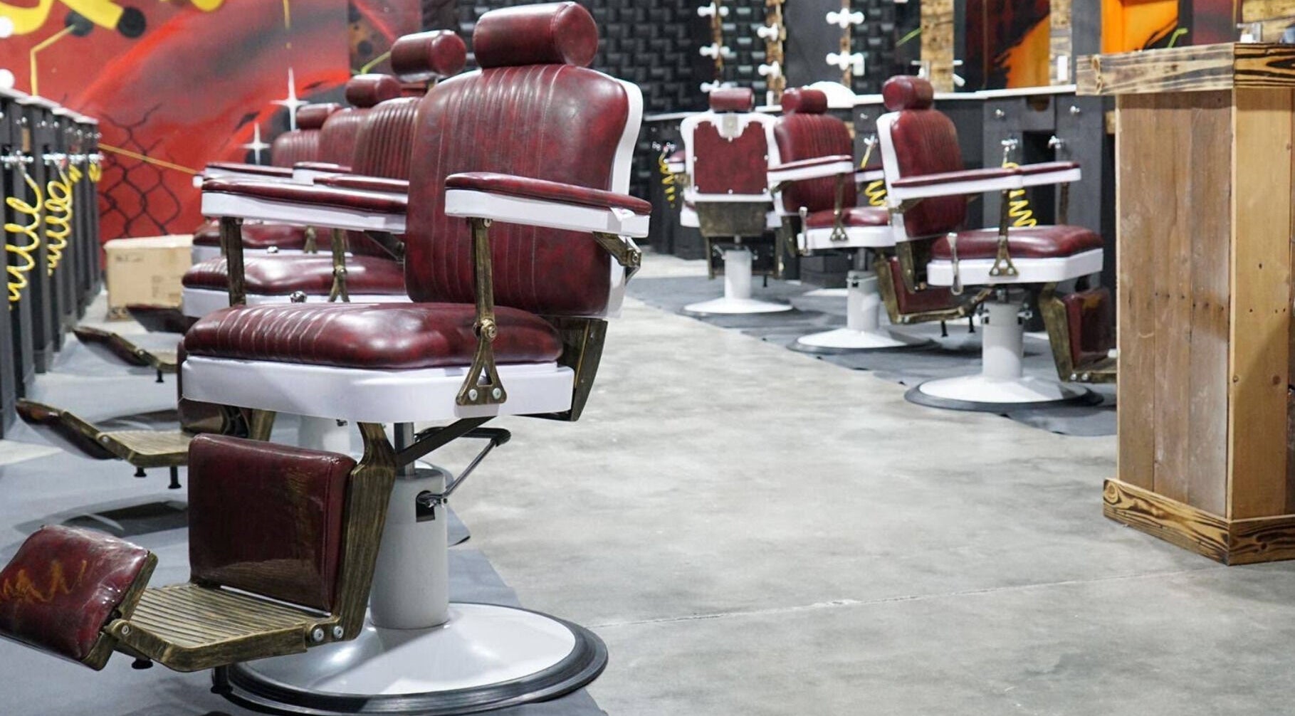 Elegant barber chairs at Choppers Barbershop in Miami, Florida, US, showcasing a modern interior design.