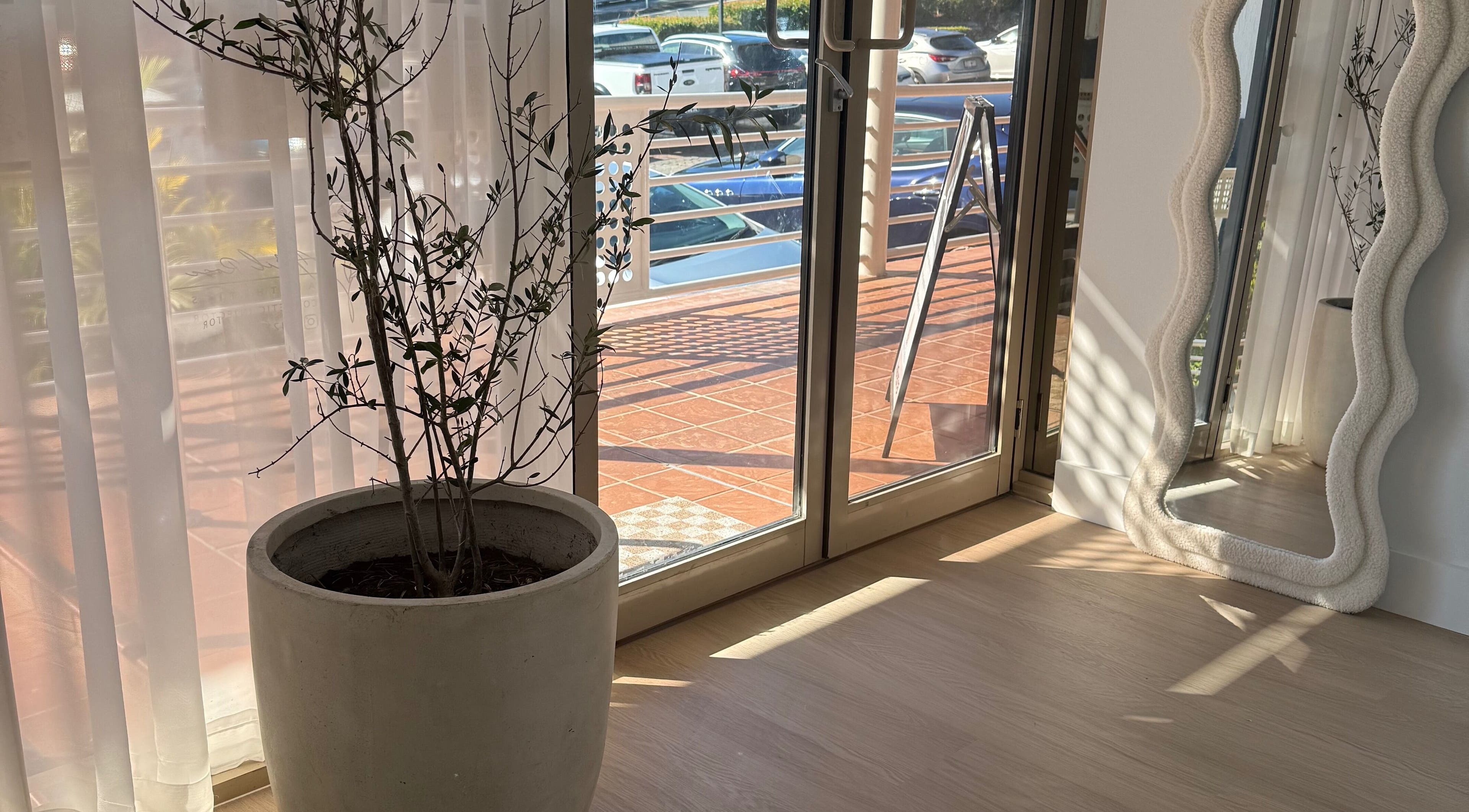 Sunlit interior at The House of Lashes Beauty Bar, Robina, Queensland, AU with elegant decor.