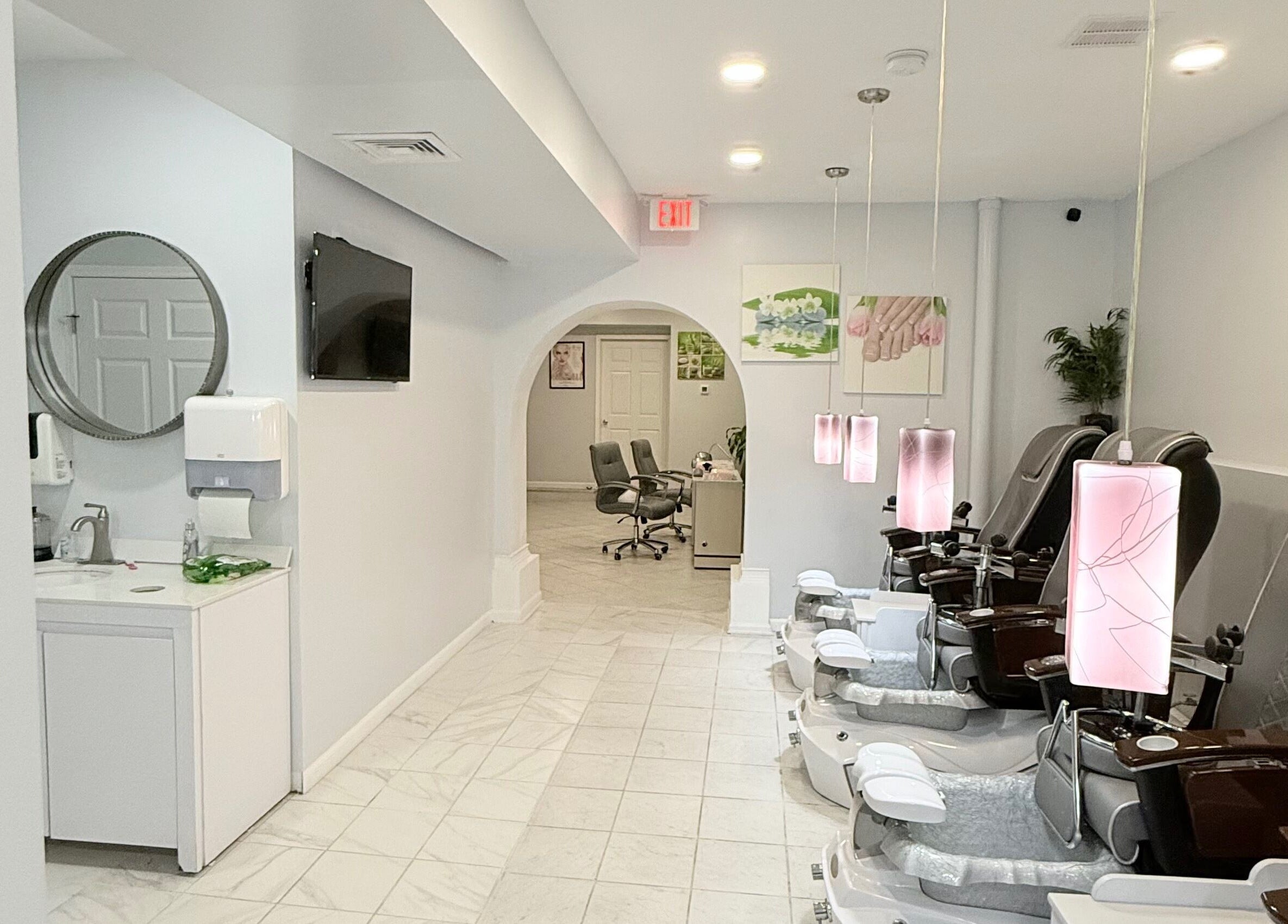 Elegant spa chairs at A&T NAIL SALON, Somerville, New Jersey, US, showcasing a modern, calm ambiance.