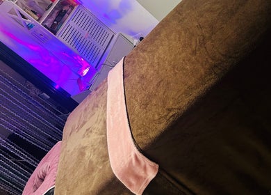 Relaxing treatment room with soft lighting at Sparkle Well-being, Saltcoats, Scotland, GB.