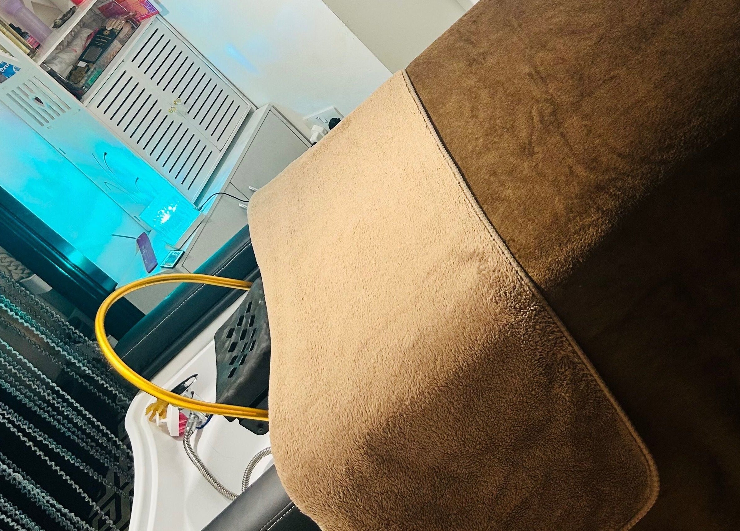 Cozy massage table setup at Sparkle Well-being, Saltcoats, Scotland, GB offering a soothing ambiance.