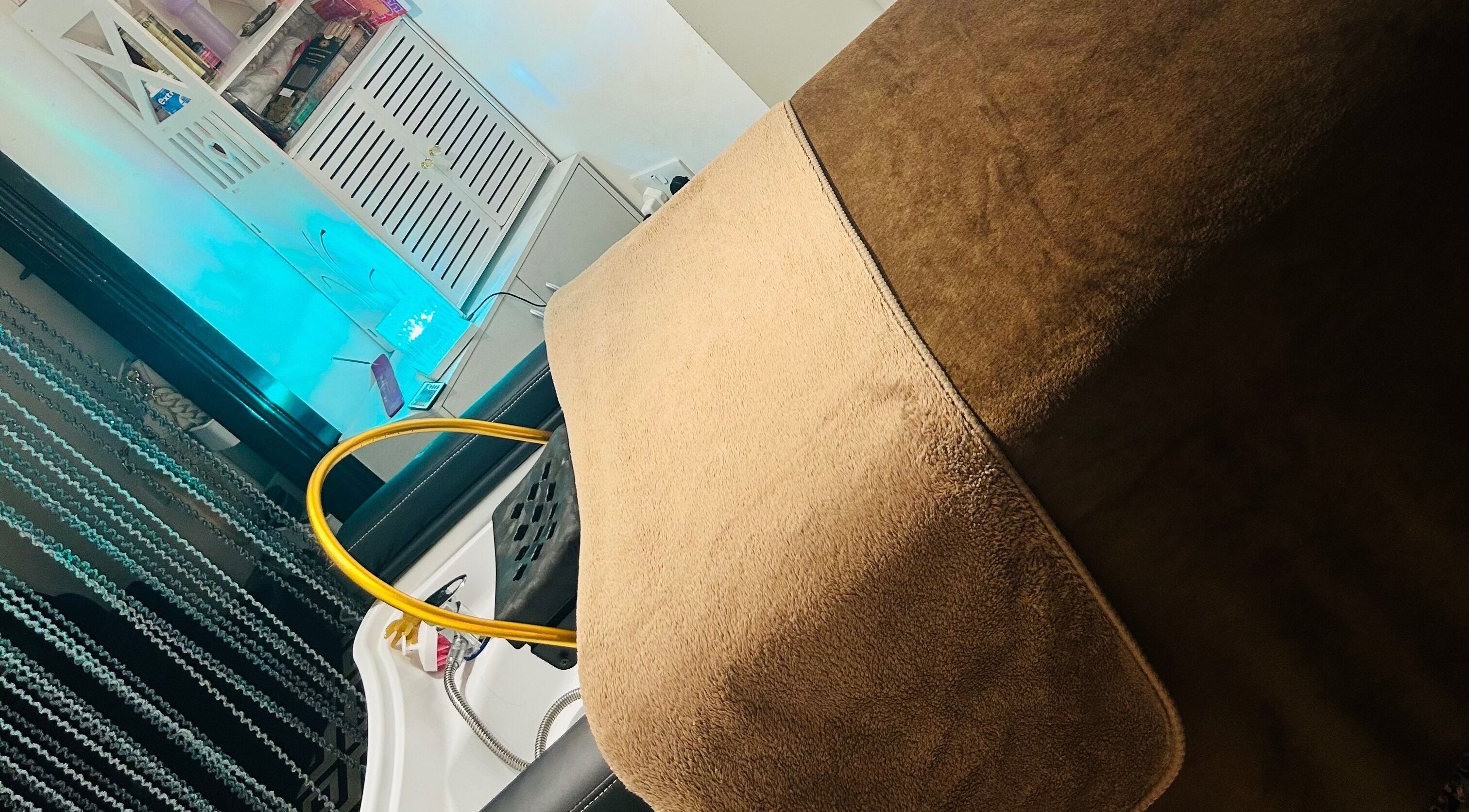 Cozy massage table setup at Sparkle Well-being, Saltcoats, Scotland, GB offering a soothing ambiance.