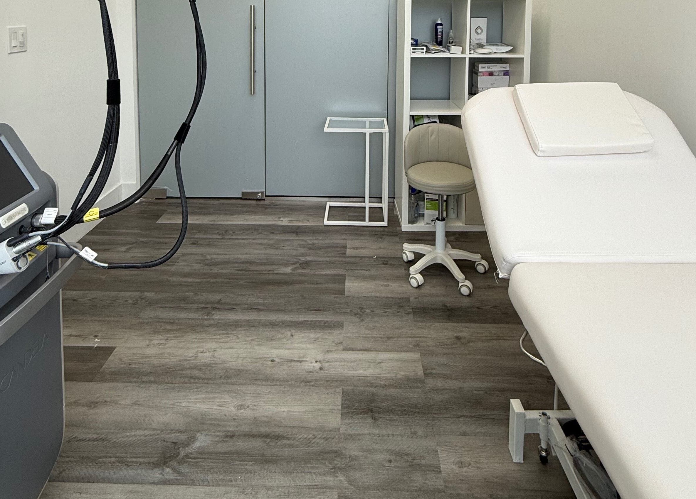 Laser treatment room at THE LAB, Miami, Florida, US. Equipped with state-of-the-art technology and bed.