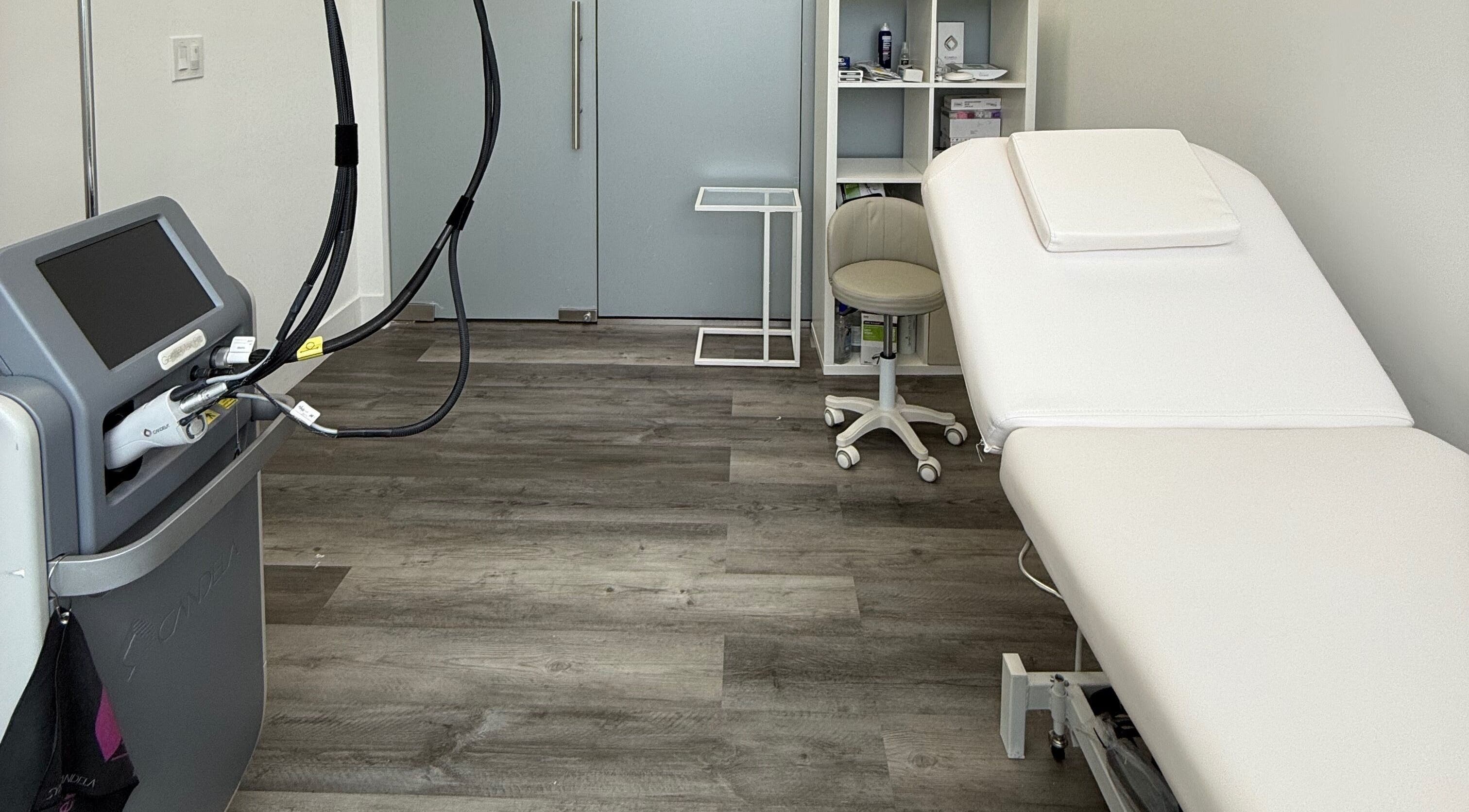 Laser treatment room at THE LAB, Miami, Florida, US. Equipped with state-of-the-art technology and bed.