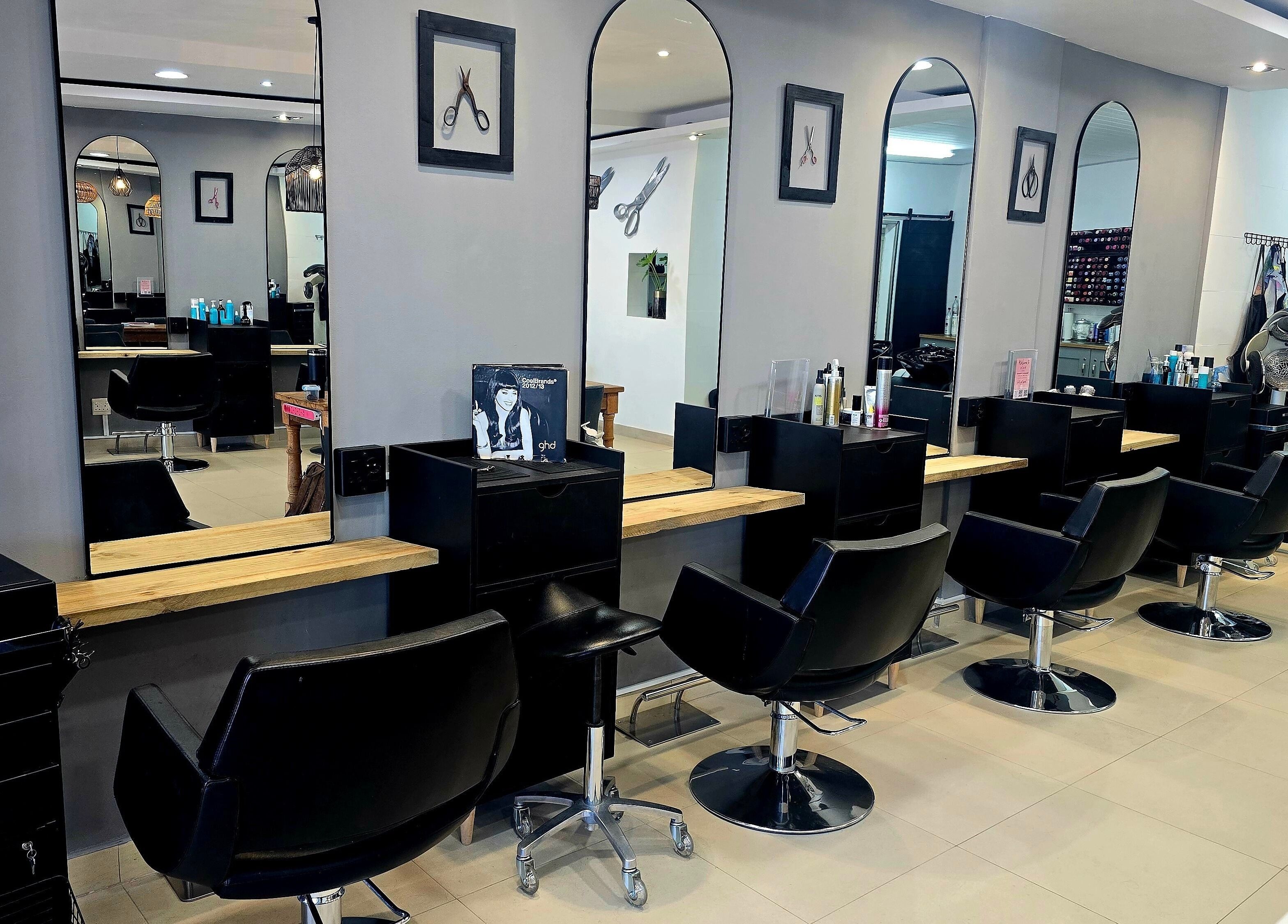 Modern styling stations at Pink Scissors Shop - Shop4 Ocean Square Sunset Beach, Cape Town, Western Cape, ZA.