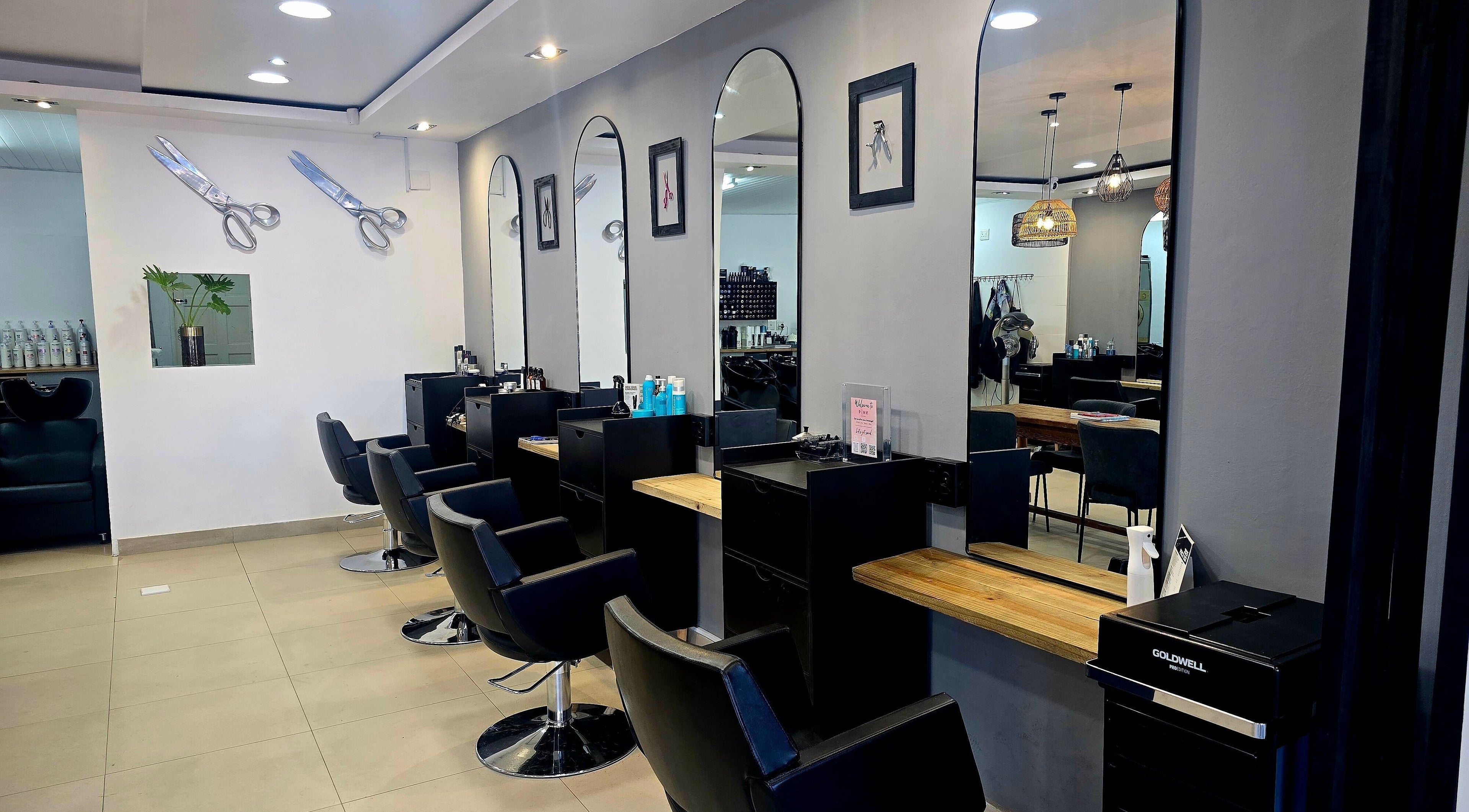 Elegant salon setup at Pink Scissors Shop - Shop4 Ocean Square Sunset Beach, Cape Town, Western Cape, ZA.