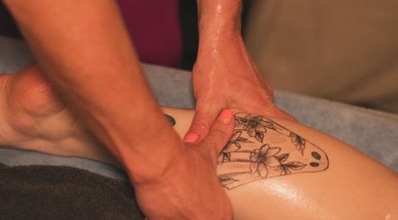 Relaxing leg massage at A Blissful Balance, Wellesbourne, England, GB enhancing wellness and tranquility.