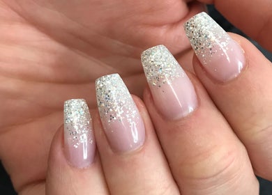 Nail art with glitter tips at Alyss Marie Beauty in Wombwell, England, GB.