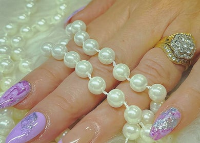 Elegant nail art with pearl accents at Diamond Nails (Perth CBD), Perth, Western Australia, AU.