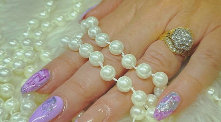 Elegant nail art with pearl accents at Diamond Nails (Perth CBD), Perth, Western Australia, AU.