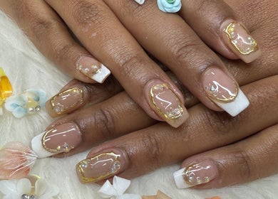 Elegant gold-trimmed nails at Langley Park Nails (East Perth), East Perth, Western Australia, AU.