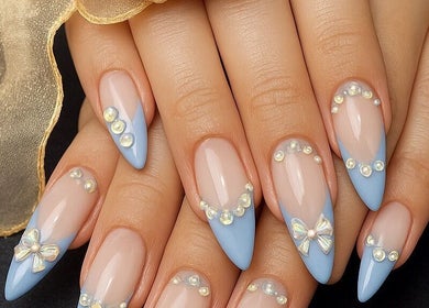 Exquisite nail art with pearls and bows at Langley Park Nails (East Perth), East Perth, Western Australia, AU.