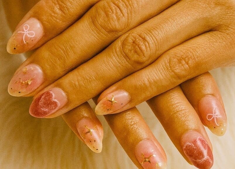 Intricate nail art at Langley Park Nails (East Perth), East Perth, Western Australia, AU. Elegant heart design.