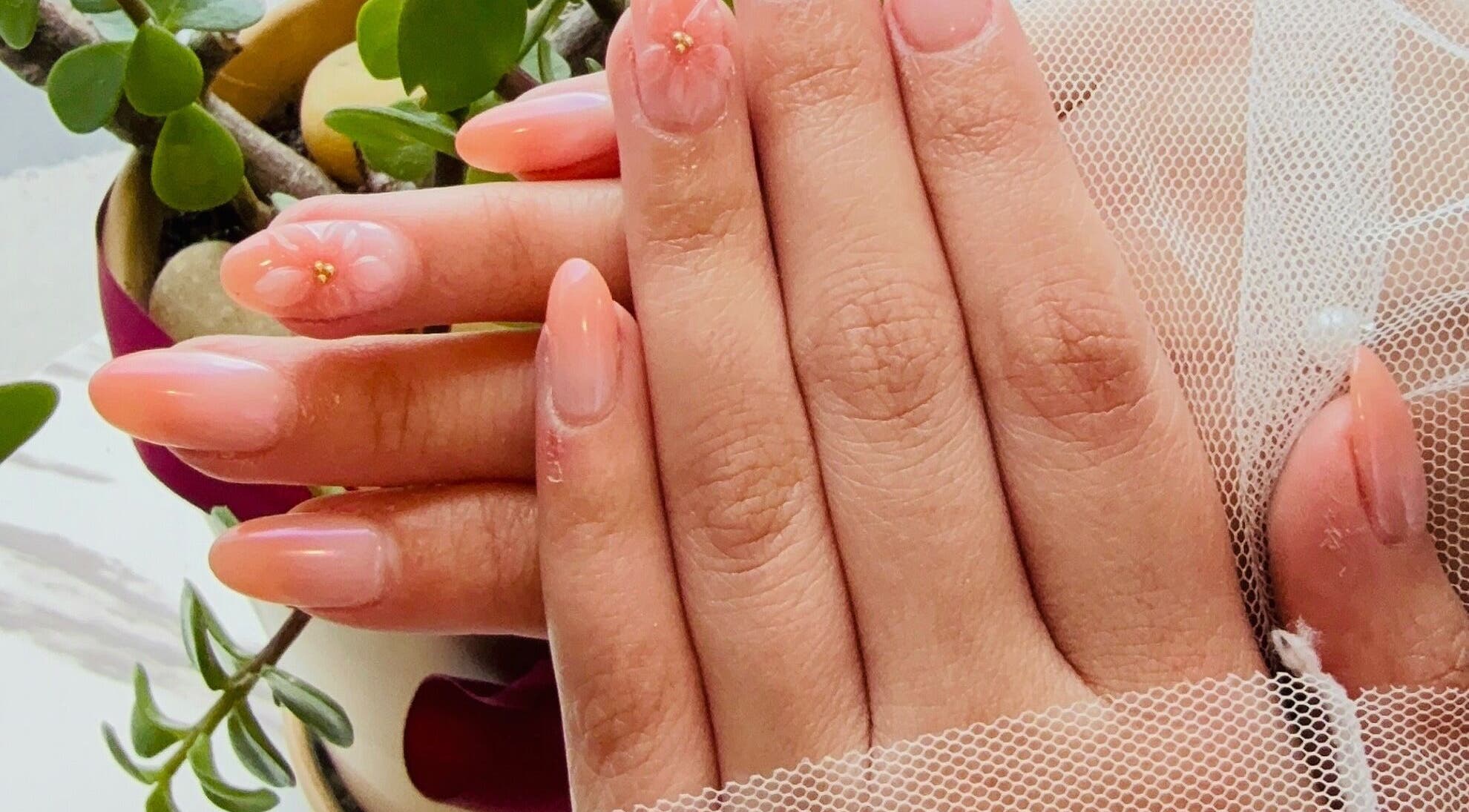 Elegant pastel manicure at Langley Park Nails (East Perth), East Perth, Western Australia, AU with a touch of floral art.