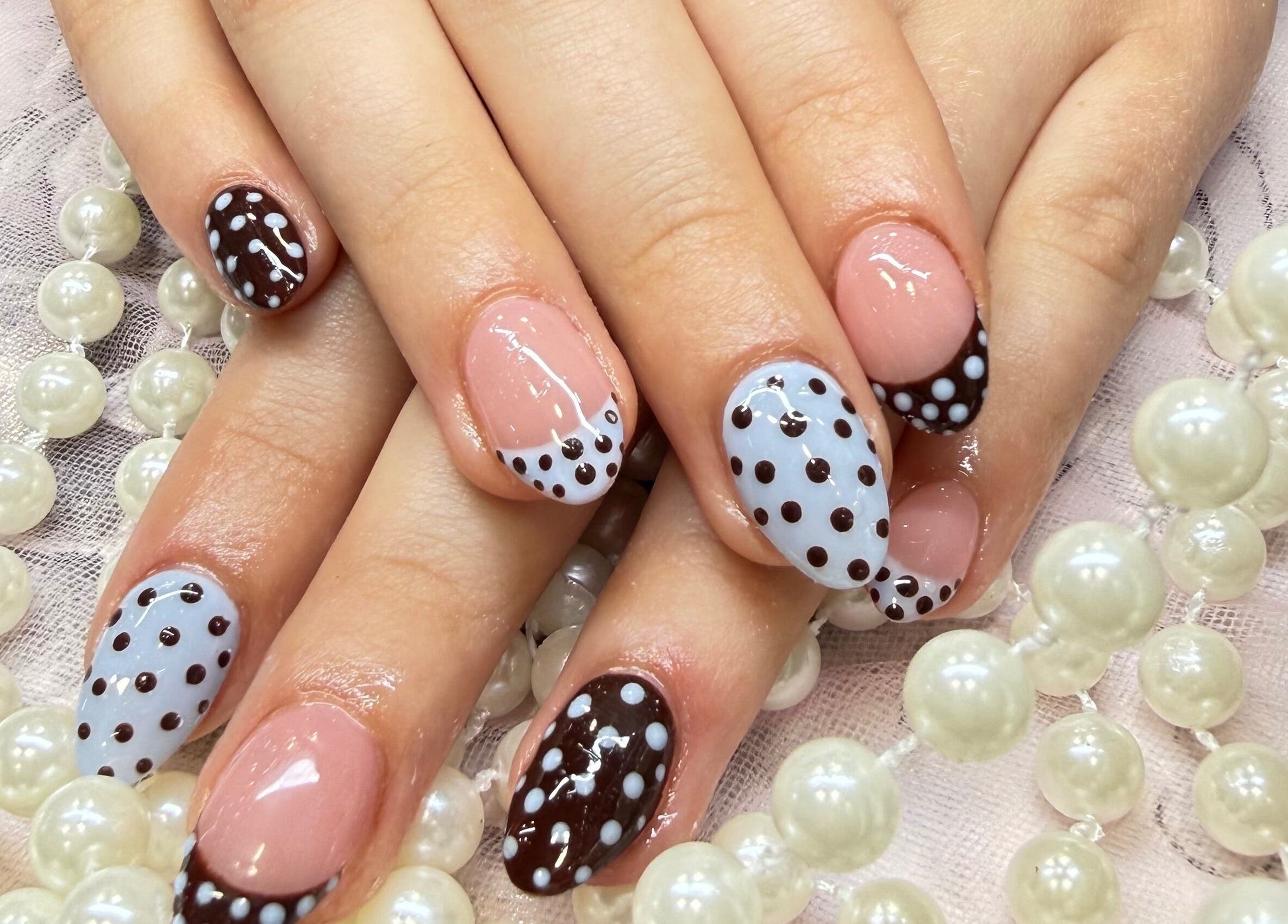 Polka dot nail art at Langley Park Nails, East Perth. Stylish manicure in East Perth, Western Australia, AU.