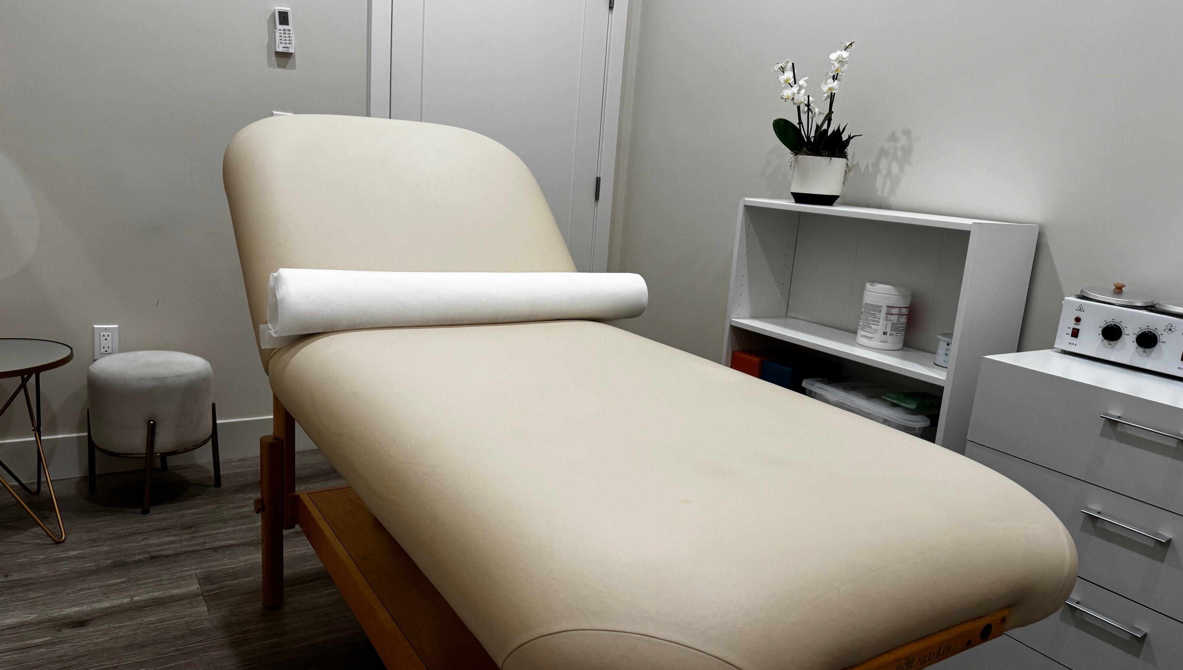 Relaxing treatment room at Sugaring & Waxing by Ervina in Los Angeles, California, US. Modern decor.