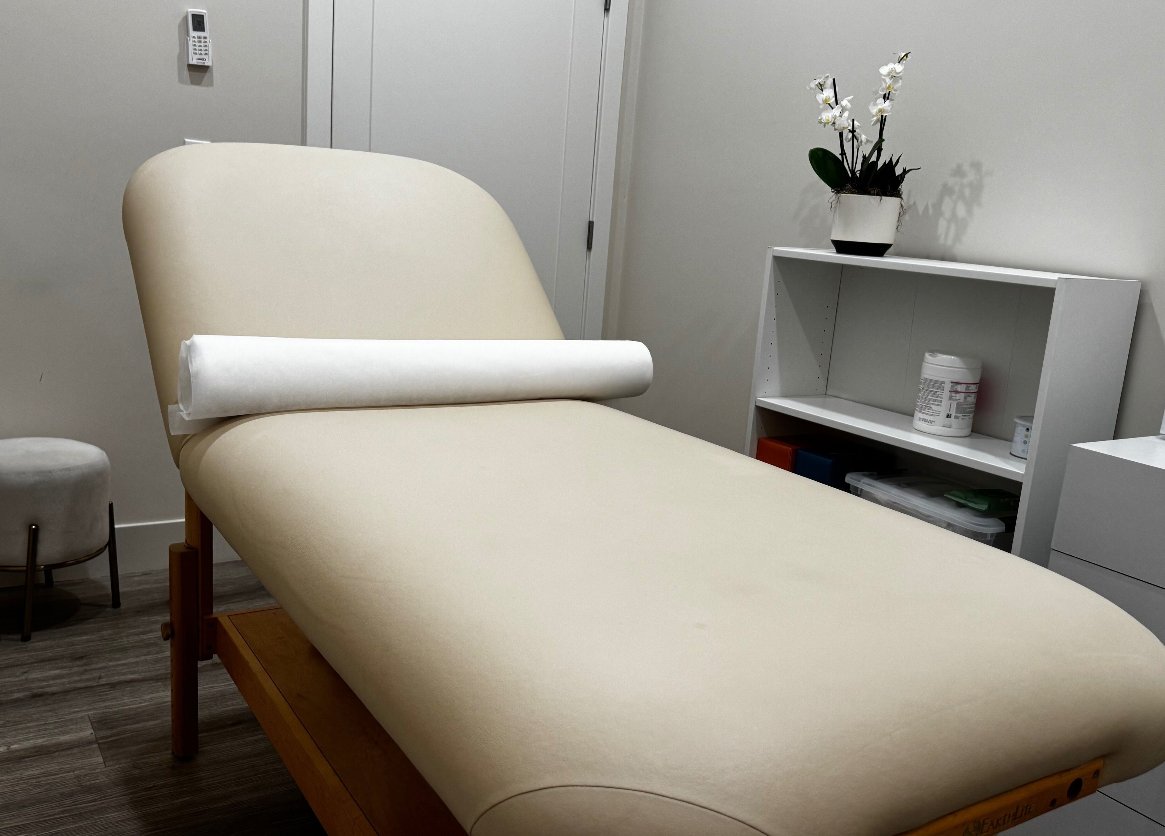 Relaxing treatment room at Sugaring & Waxing by Ervina in Los Angeles, California, US. Modern decor.