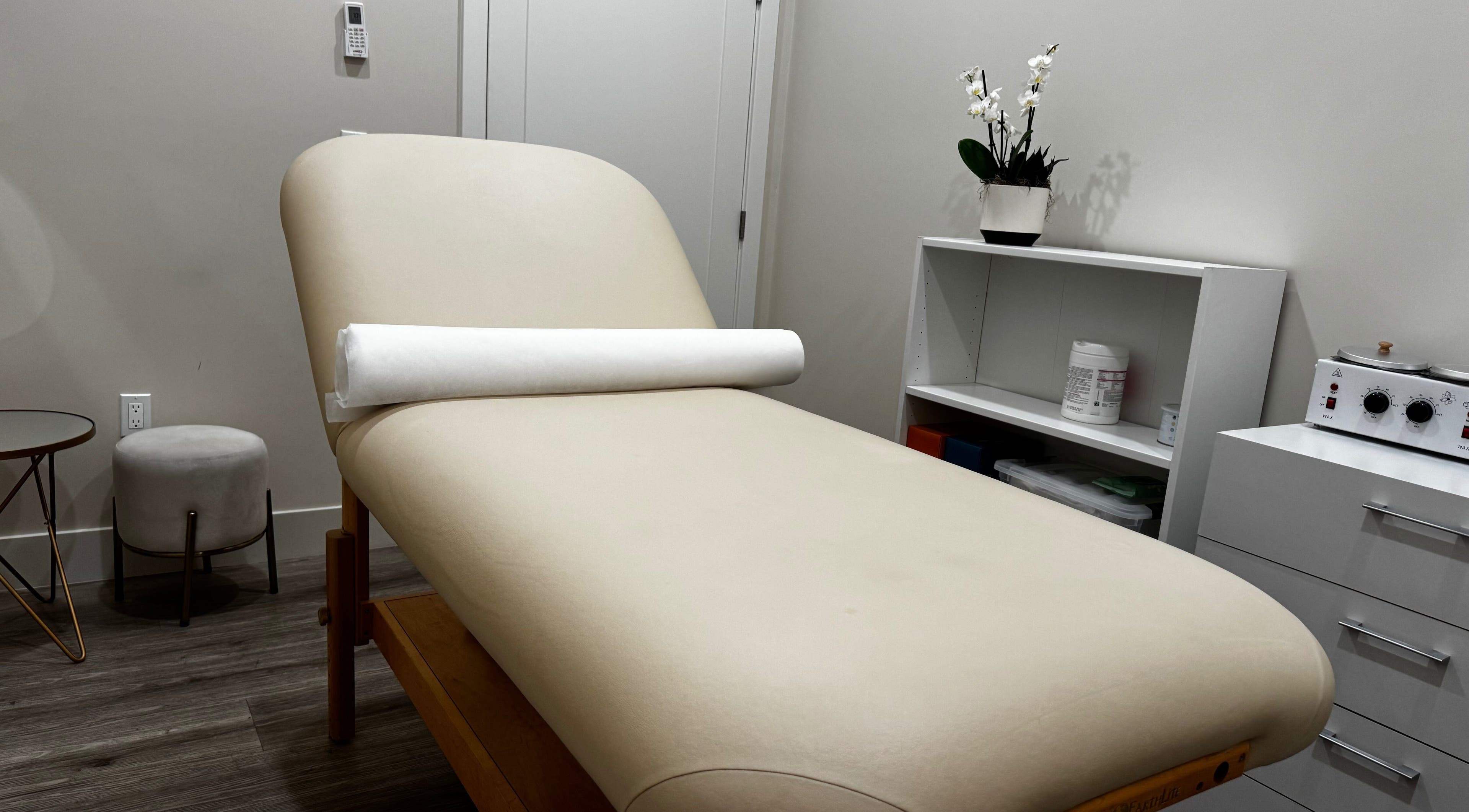 Relaxing treatment room at Sugaring & Waxing by Ervina in Los Angeles, California, US. Modern decor.