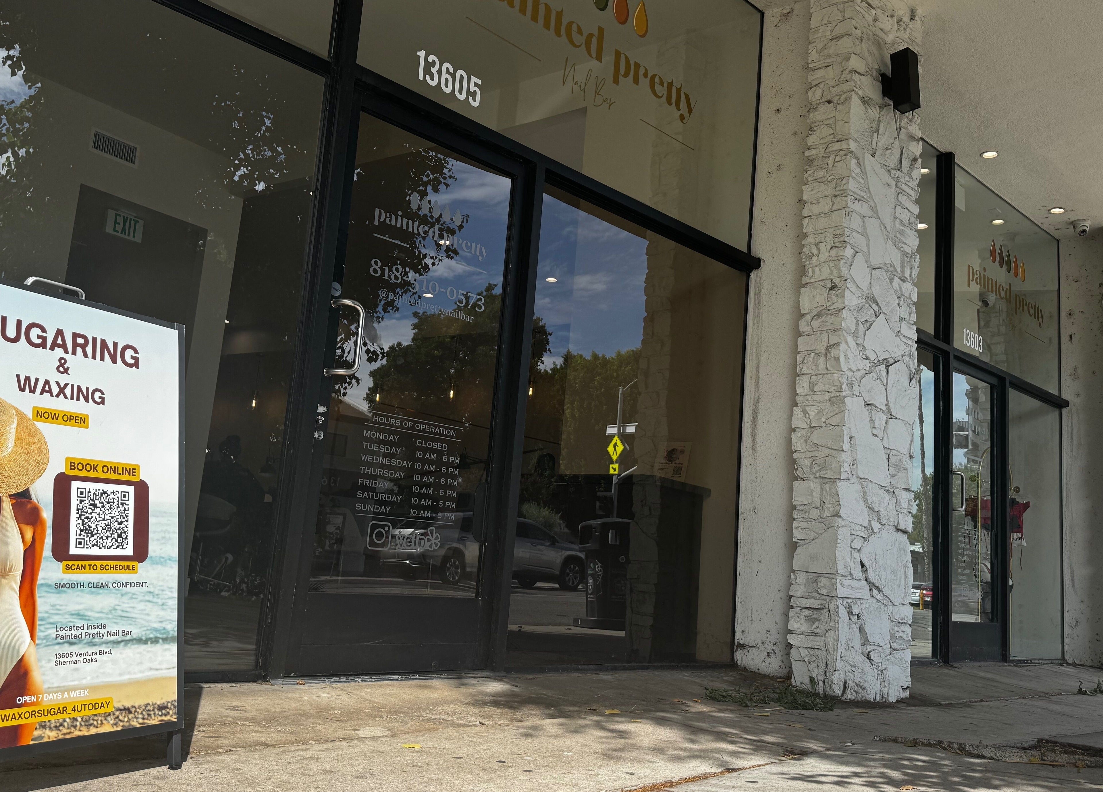 Exterior of Sugaring & Waxing by Ervina, Los Angeles, California, US, showing a stylish entrance and beauty signage.