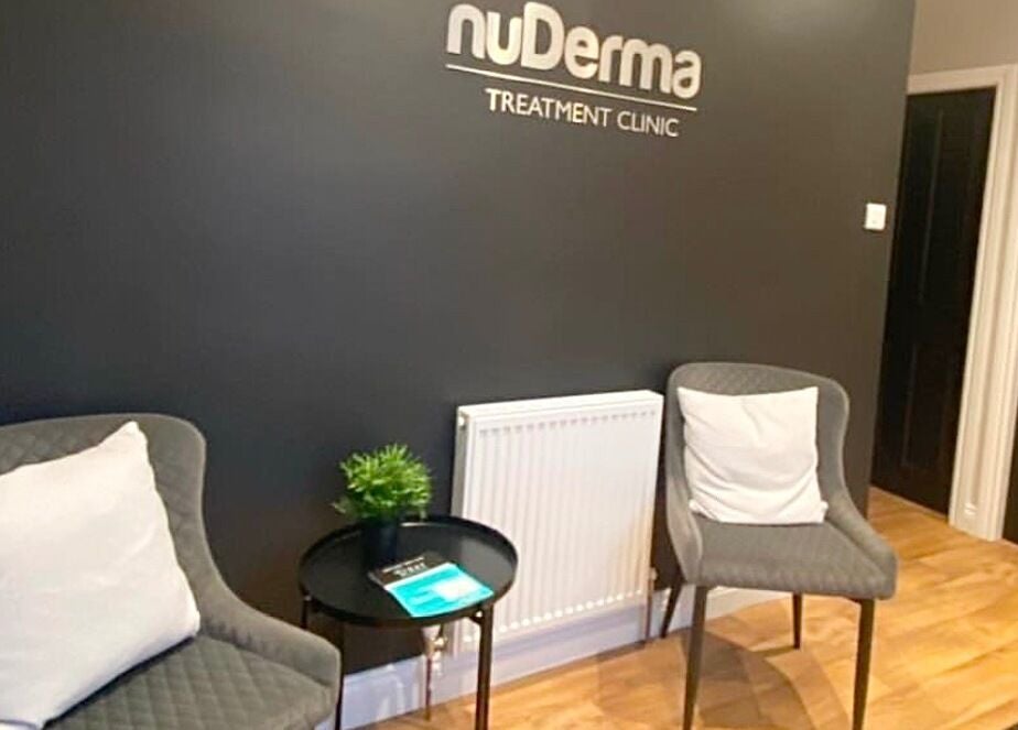 Relaxing seating area at Rachael Ann Aesthetics & Beauty in Harrogate, England, GB with chairs and table.